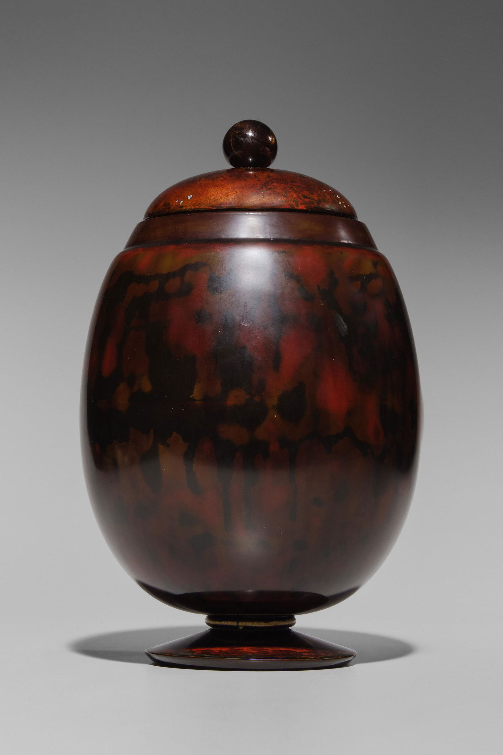 Marcel Wolfers (Belgian, 1886-1976): Urn with Lid - 1928 Lacquered wood, semi-precious stone, and mother of pearl 29 cm Inscribed with name and date underneath Provenance: Private collection, Brussels The signature and date underneath th