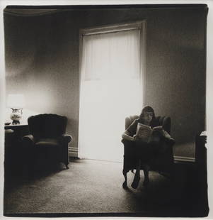 Diane Arbus (American, 1923 - 1971): Lady in a Rooming House Parlor, Albion, NY - 1963 Gelatin silver print 22,4 x 21,3 cm Provenance: Robert Miller Gallery, New York With a certificate of authenticity by Doon Arbus for the Estate of Di
