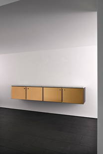 Christophe Gevers (Belgian, 1928-2007): Suspended cupboard - 1971 Brass, marble, wood, and cork 48 x 240 x 40 cm Custom-made, unique piece Provenance: Dany De Schutter Collection, Waterloo Private collection, Brussels Published: Jean-Pier