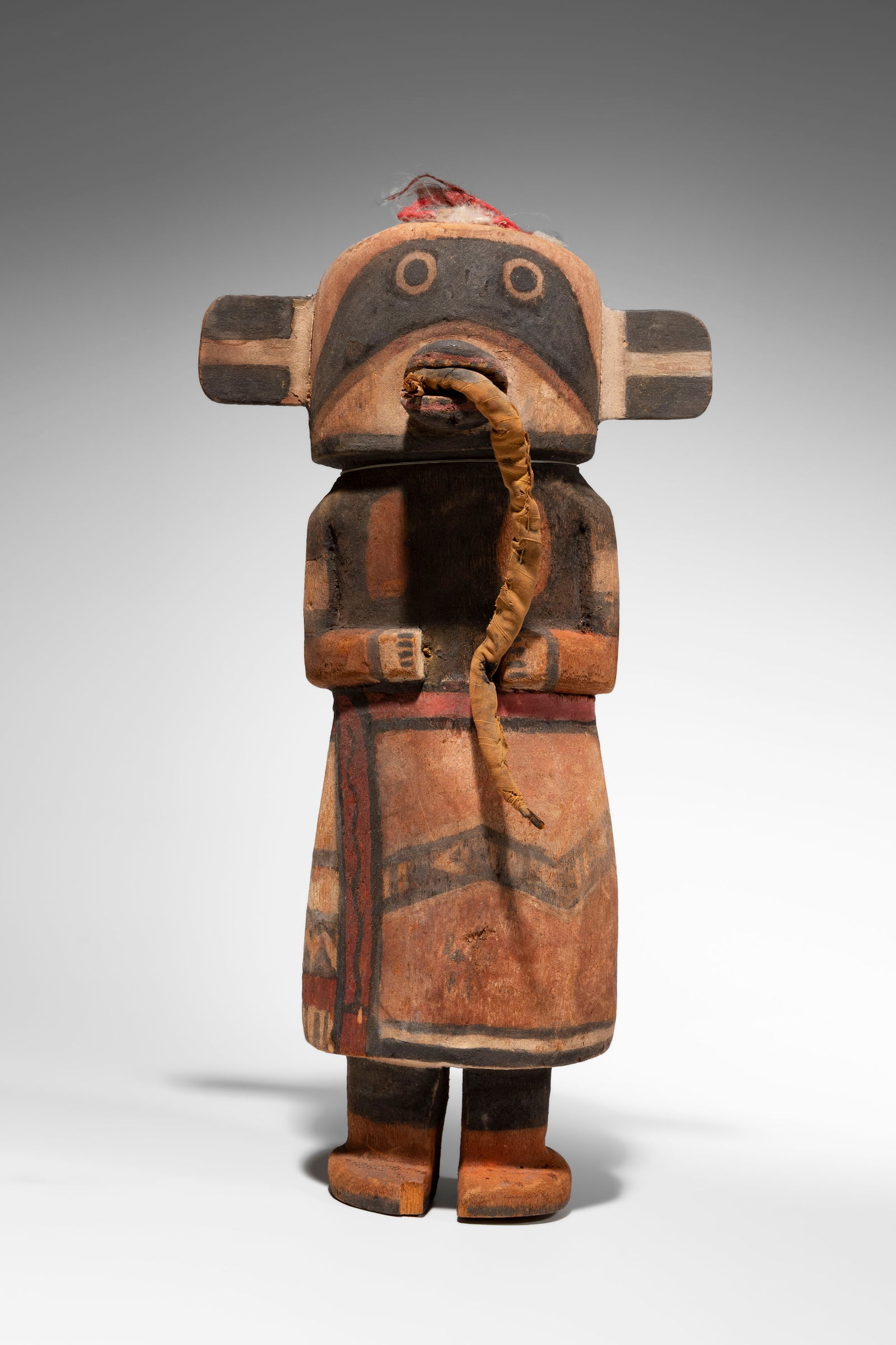 A Hopi Kachina Doll: Attributed to Wilson Tawaquaptewa (1871-1960)Southwestern U.S.A.Polychrome wood and fabric, 32,5 cm Provenance: Enrico Donati Collection, New YorkSotheby's, New York, African, Oceanic and Pre-Colum
