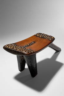 Lobi Stool: Burkina Faso Wood and brass tacks, 14 x 40 x 13 cm Provenance: Marc and Denyse Ginzberg Collection, New York Private collection, Belgium Published: Marc Ginzberg, African Forms, Skira, Milan, 2000,