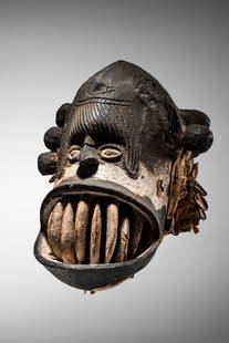 Igbo Mgbedike Mask: Nigeria Wood, pigment, and vegetal fibers, 40 cm Provenance: Private collection (1988) Collection Robert Saintgéry, Bagneux (2012) Olivier Castellano, Paris (2019) Montagut Gallery, Barcelona