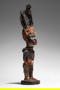Kongo Power Figure - Nkisi: D.R. Congo Wood, textile, cowrie shell, mirror, and feathers 20 cm (30 cm incl. feathers) Provenance: Louis Pieter Cornelis van Rijn (Lode 1910-1997), Galerie Khepri, Amsterdam Ludwig Bretschneider