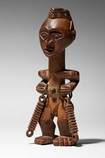 Songye Figure: D.R. Congo Wood and metal14,3 cm Provenance: Karel Plasmans Collection, BelgiumThence by descent