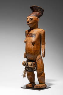 Mangbetu Figure: D.R. Congo Wood, pigment, and raffia 63 cm Provenance: Acquired in situ by Eugenia de Galberg c.1930 By descent Artcurial, Briest-Poulain-F.Tajan, Paris, Art Tribal, 22 June 2015, lot 38 Private