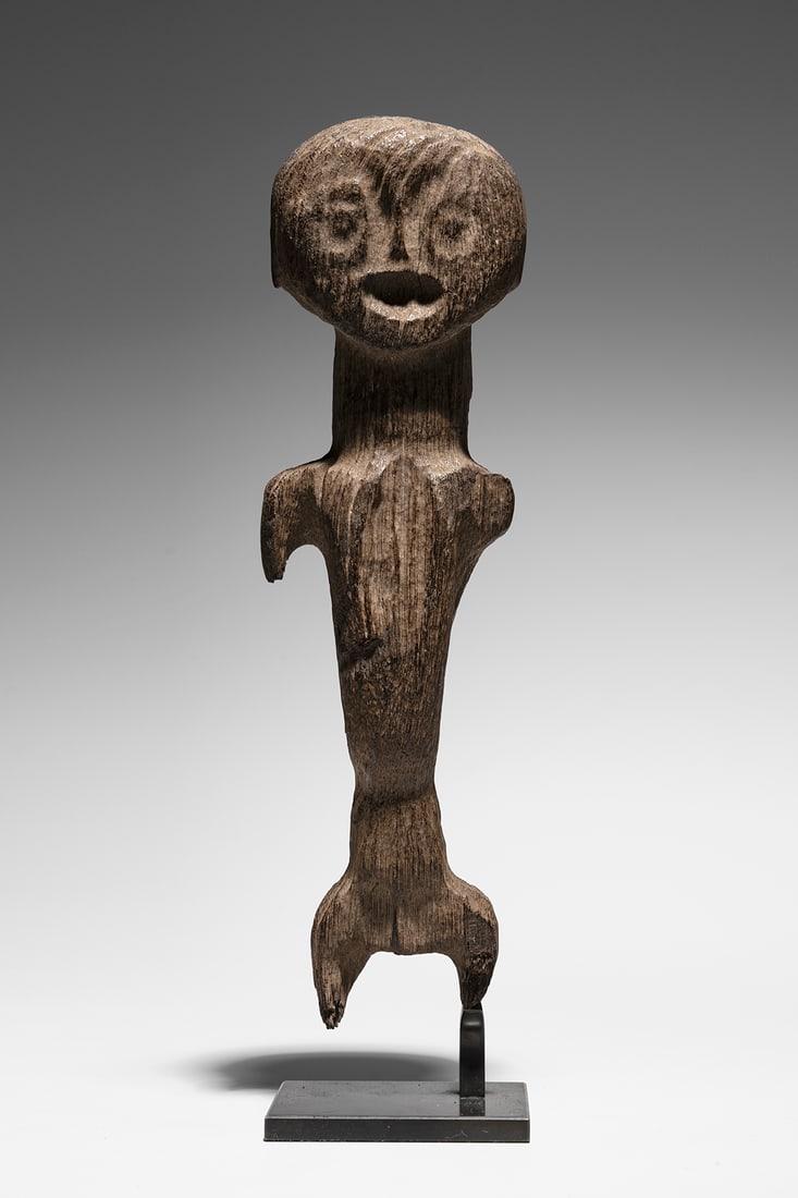 Archaic Borneo Figure: West Borneo, Indonesia Proto-Dayak, c 3300 - 3100 BC (by radiocarbon testing) Ironwood, 28 cm Provenance: Private collection, France Recovered from riverine deposits in northwestern Borneo, this