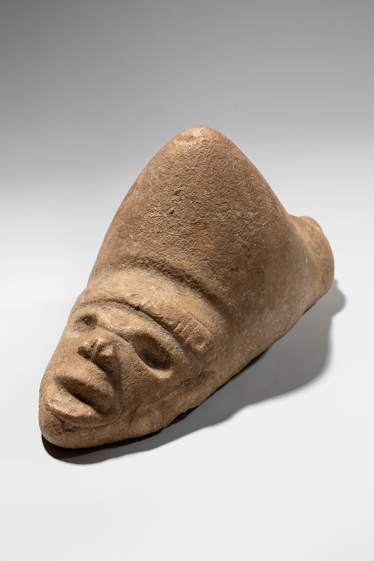 Taíno Trigonolith: Utuado, Puerto Rico, 1000-1500 Stone 28 x 13 cm Provenance: Alice de Santiago, Barcelonata, Puerto Rico George Heye, New York (acquired in 1928) Museum of the American Indian, Heye Foundation, New