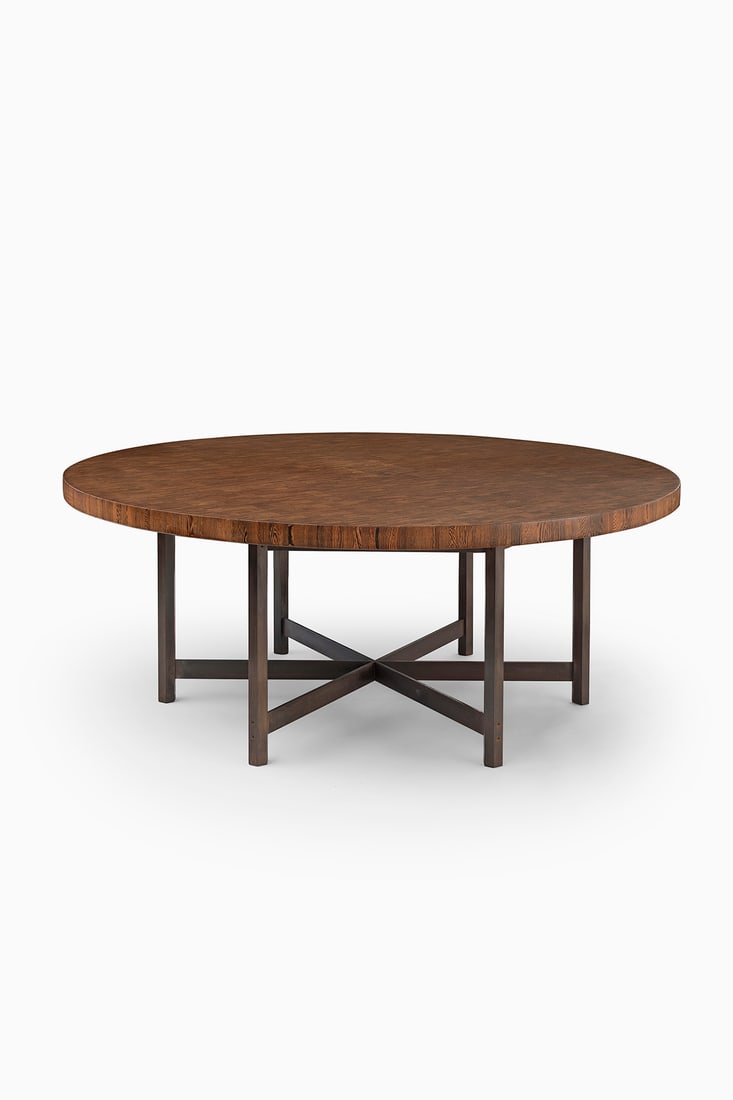 Jules Wabbes (Belgian, 1919-1974): Large Dining Table End grain wengé wood and patinated steel 73 x 184 cm Ø