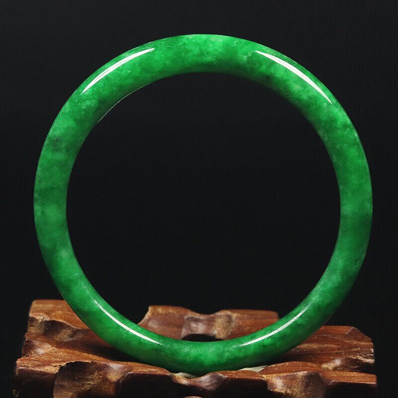 Chinese natural green jade bangle: Size: Width 54 mm - Thickness 7.5 mm Materials: Natural jade Time Period: qing dynasty Manufactured Date: qing dynasty Origin: China