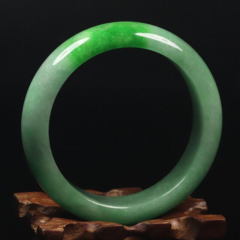 Chinese natural green jade bangle: Size: Width 59 mm - Thickness 9 mm Materials: Natural jade Time Period: qing dynasty Manufactured Date: qing dynasty Origin: China