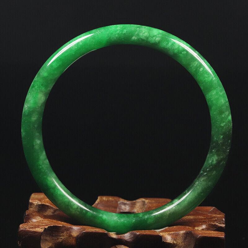 Chinese natural green jade bangle: Size: Width 59 mm - Thickness 6.5 mm Materials: Natural jade Time Period: qing dynasty Manufactured Date: qing dynasty Origin: China