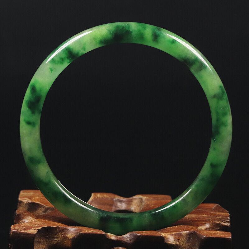 Chinese natural green jade bangle: Size: Width 56 mm - Thickness 6.5 mm Materials: Natural jade Time Period: qing dynasty Manufactured Date: qing dynasty Origin: China
