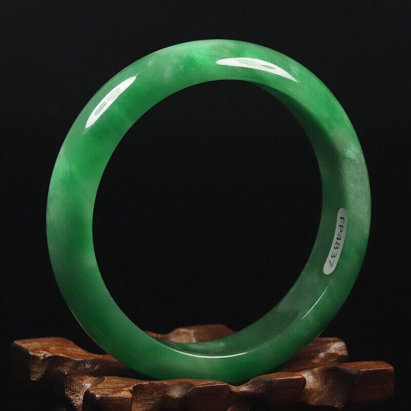 Chinese natural green jade bangle: Size: Width 59 mm - Thickness 8 mm Materials: Natural jade Time Period: qing dynasty Manufactured Date: qing dynasty Origin: China