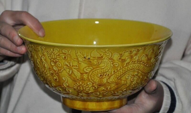 Chinese yellow glaze porcelain bowl: Size: Width 21.5 cm - Height 8.5 cm Materials: Porcelain Time Period: Ming dynasty Manufactured Date: Hongzhi Mark & Period Origin: China