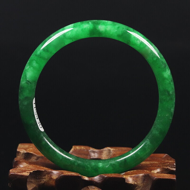 Chinese natural green jade bangle: Size: Width 53 mm - Thickness 7 mm Materials: Natural jade Time Period: qing dynasty Manufactured Date: qing dynasty Origin: China