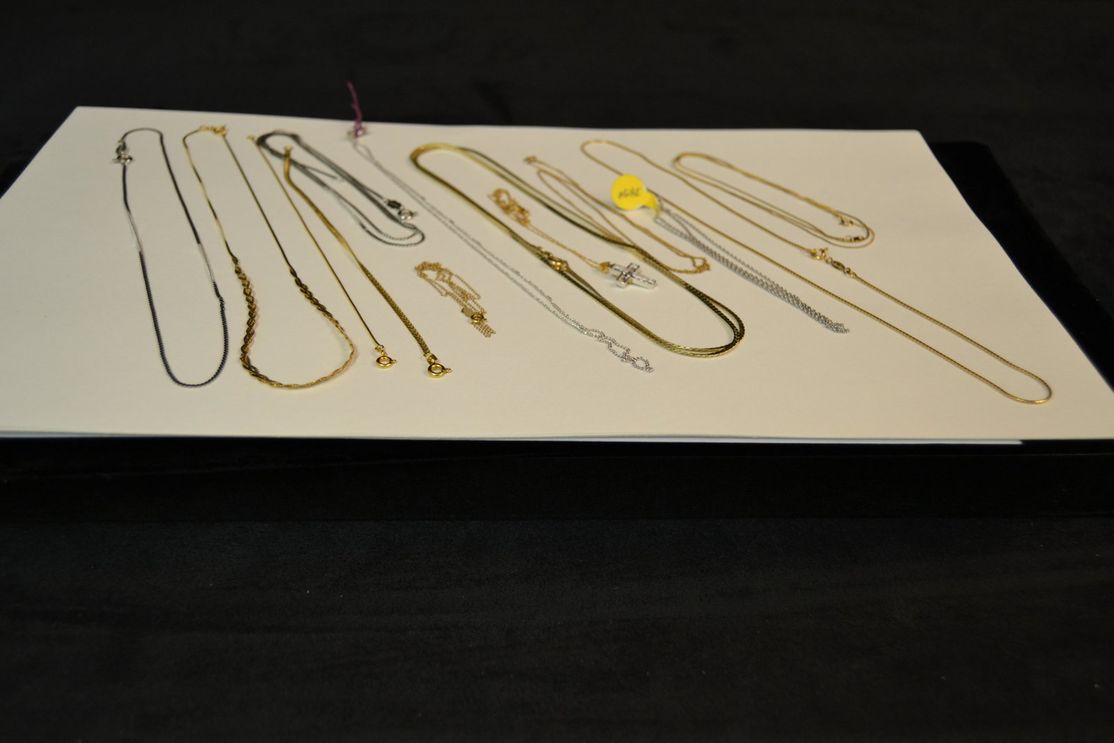 14K Gold Chains: Lot includes 13 - 14K Gold chain necklaces and bracelets in yellow and white gold, some clasps ferromagnetic, total weight: 32.2g