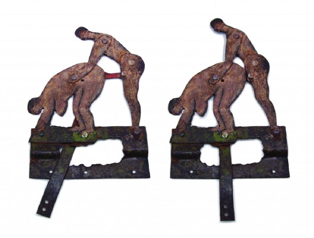 Part of an Erotic Mechanical Shooting Target: Constructed of sheet iron and painted in colour. Probably Germany circa 1900, height 27.5 cm. Condition 3