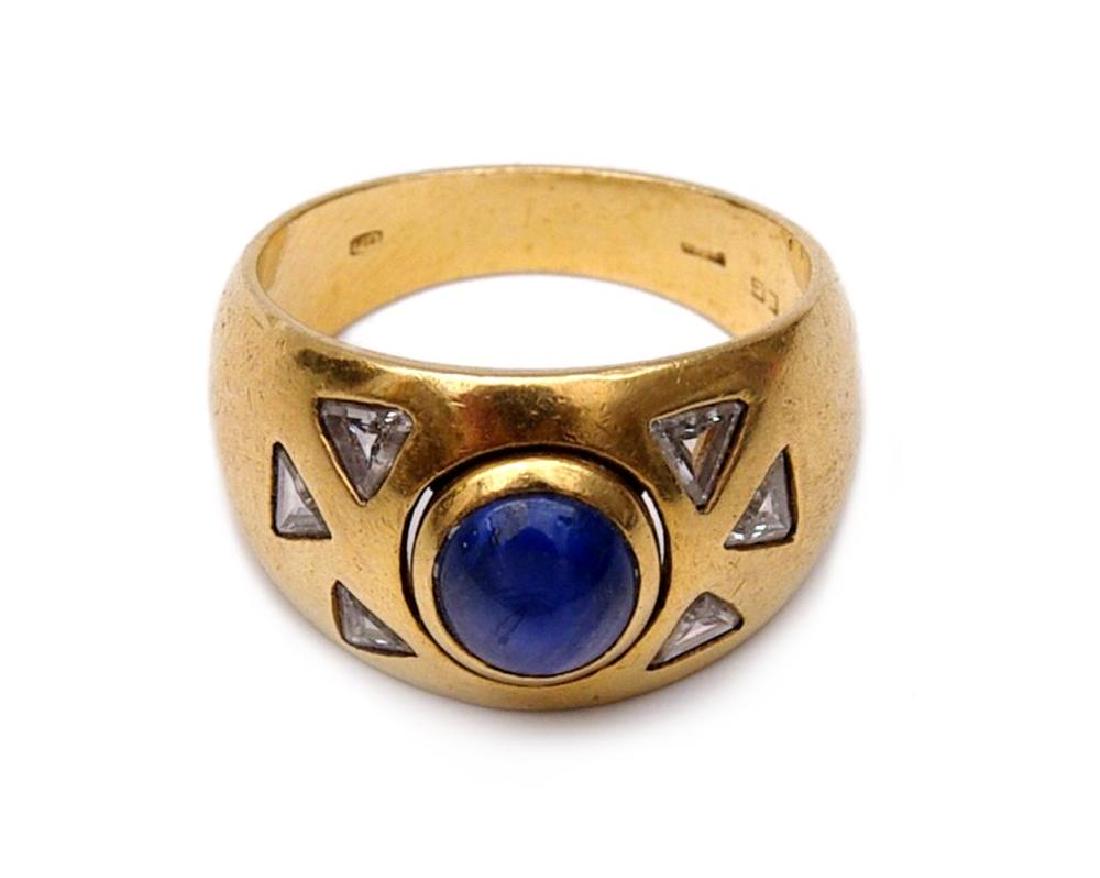 A blue sapphire cabochon and diamond ring (1 of 1)