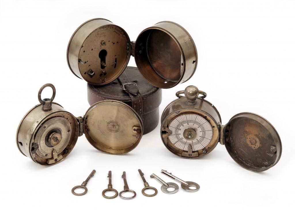 Watchmans/Security Guard Time Clocks in Leather Case: 1) Brass clock case marked 'Hermann Schefter, Hohenstadt'. 2) Unmarked brass clock case, key-winding, original key, 3) Brass clock case marked L. Hainz, Praha, original key.