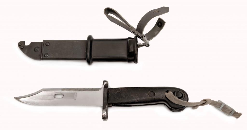 Two Bayonets: 1) The First Pattern AKM Bayonet Type 6H3. Polish, 2nd half of the 20th century, length 33 cm. 2) Swiss SIG Stgw 1957 pattern bayonet and scabbard, leather frog marked W. Rohr, Staufen. Length 38 cm. 