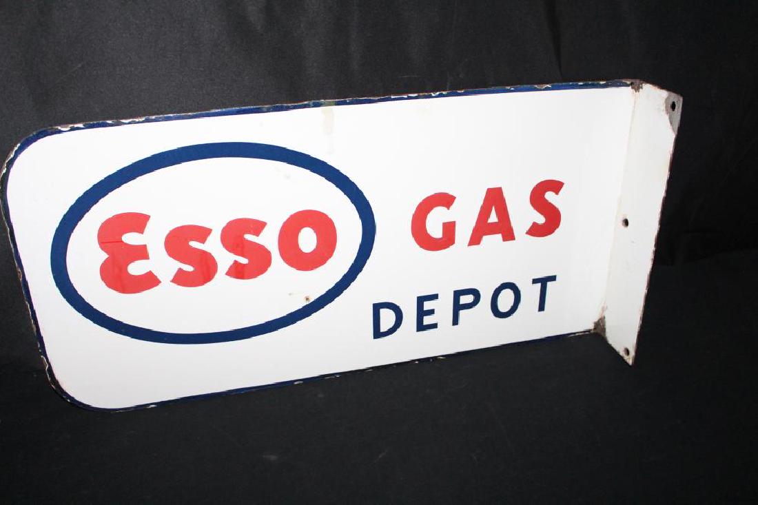 PORCELAIN ESSO GAS DEPOT FLANGE SIGN: PORCELAIN ESSO GAS DEPOT FLANGE SIGN DSP, 26X13". EUROPEAN SIGN. APPROXIMATE SHIPPING COST $30 TO $45. THIS ITEM IS GUARANTEED OLD AND ORIGINAL.