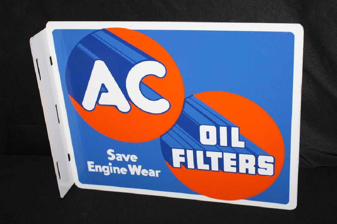 NOS AC OIL FILTERS TIN FLANGE SIGN: NOS AC OIL FILTERS TIN FLANGE SIGN DST, 15X12". APPROXIMATE SHIPPING COST $20 TO $25. THIS ITEM IS GUARANTEED OLD AND ORIGINAL.