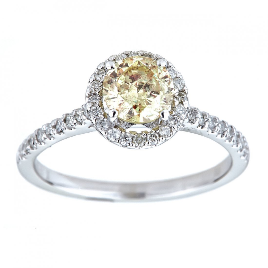 0.79 Carat H VS2 Round Brillant Halo Diamond Ring (1 of 2)