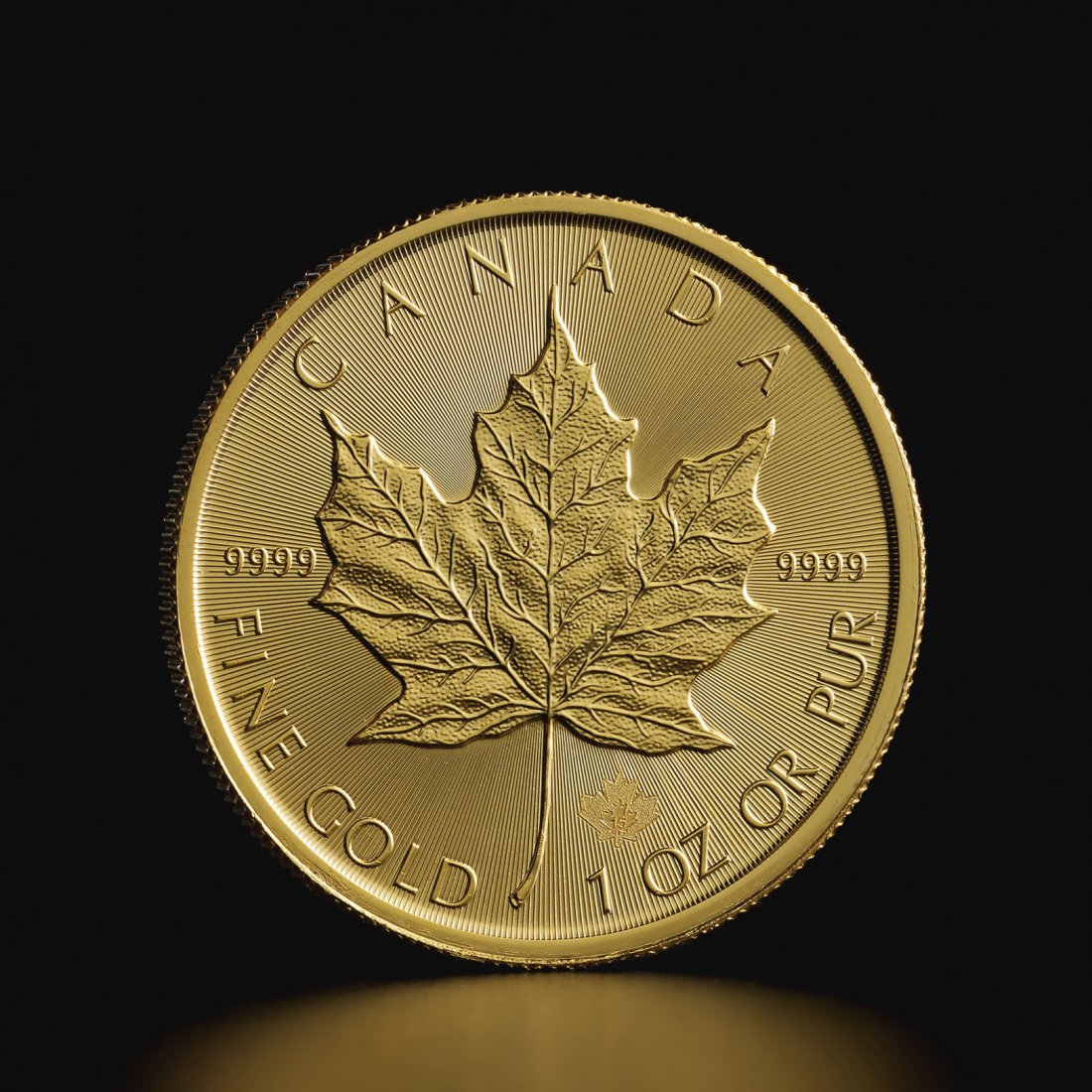 1 oz Canadian Maple Leaf Gold Coin: Contains 1 oz of .9999 fine Gold.