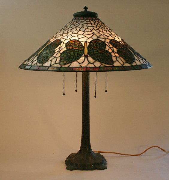 Riviere Studios Leaded Glass Butterfly Lamp: Riviere Studios Leaded Glass Butterfly Lamp. Large 23" diameter leaded glass shade with white granite background and rainbow wing glass. The wings are done with an overlay similar to what Tiffany Stud