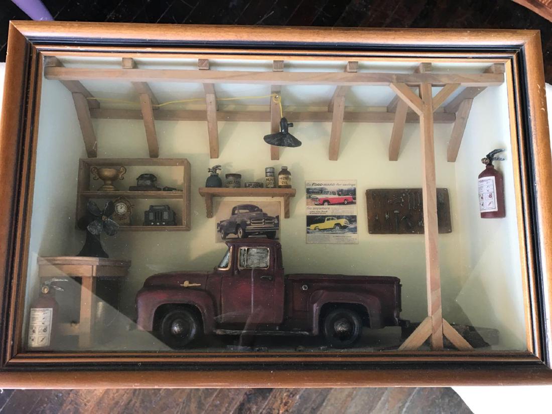 55 Ford pick up in garage (decorative shadow box).: 55 Ford pick up in garage (decorative shadow box). Approx 9 1/4"x 14 1/4"