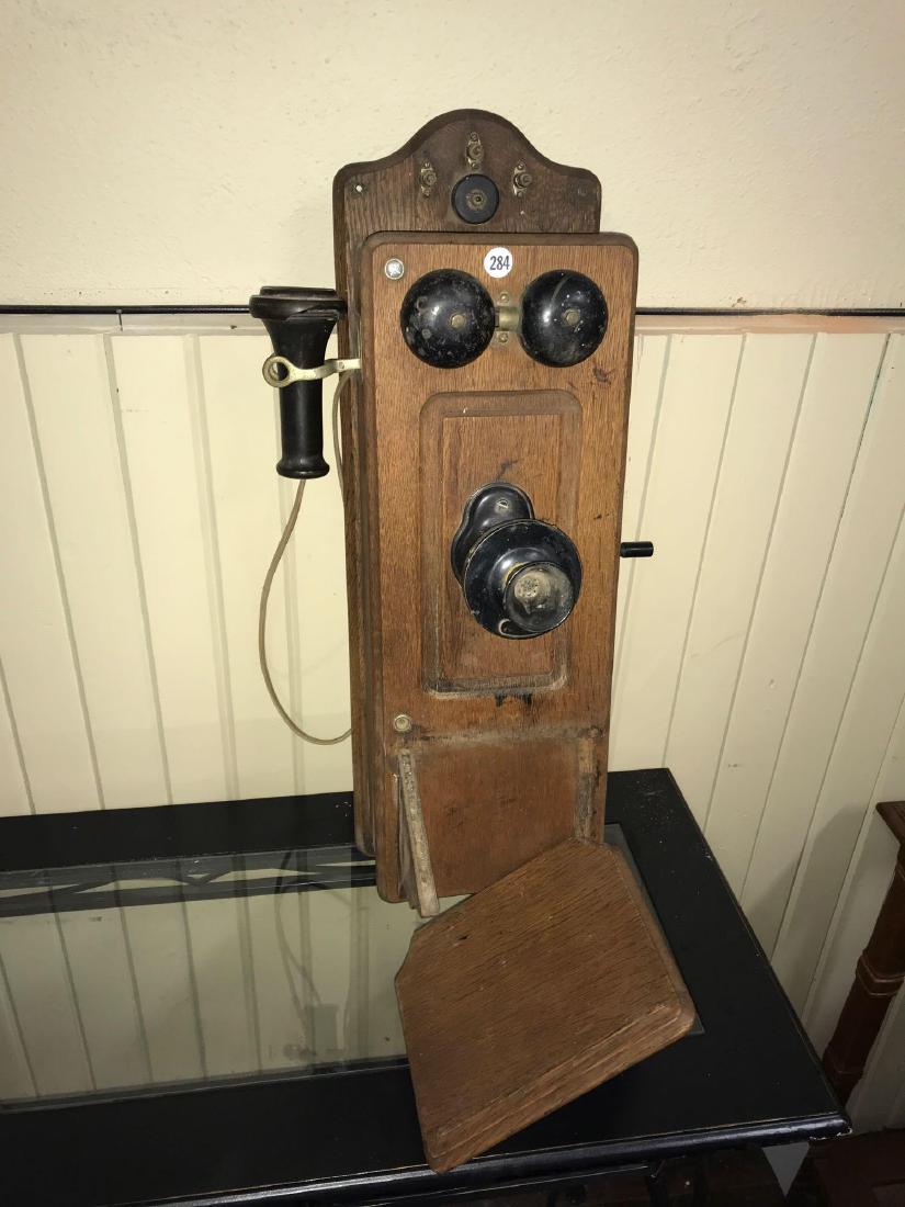 American wall crank telephone (as is). Approx 7 1/2"w x: American wall crank telephone (as is). Approx 7 1/2"w x 5"d x 25"h