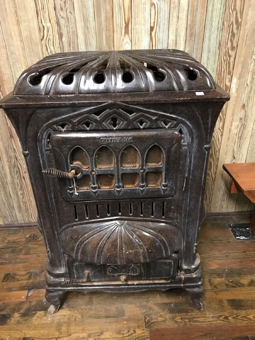 Charter Oak Coal Heating Stove. Approx 31 x 24 x 42