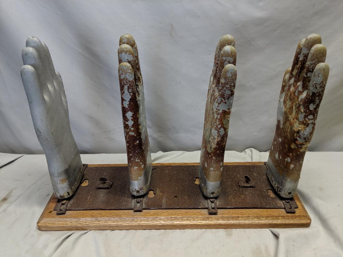 Antique Set 4 Glove Manufacturing Mold on Oak Wood Base: Antique Set 4 Glove Manufacturing Mold on Oak Wood Base Normal wear with age with some surface rust 23 x 9 base x 15 high Shipping in continental US $30.00 Please ask any questions before bidding Good