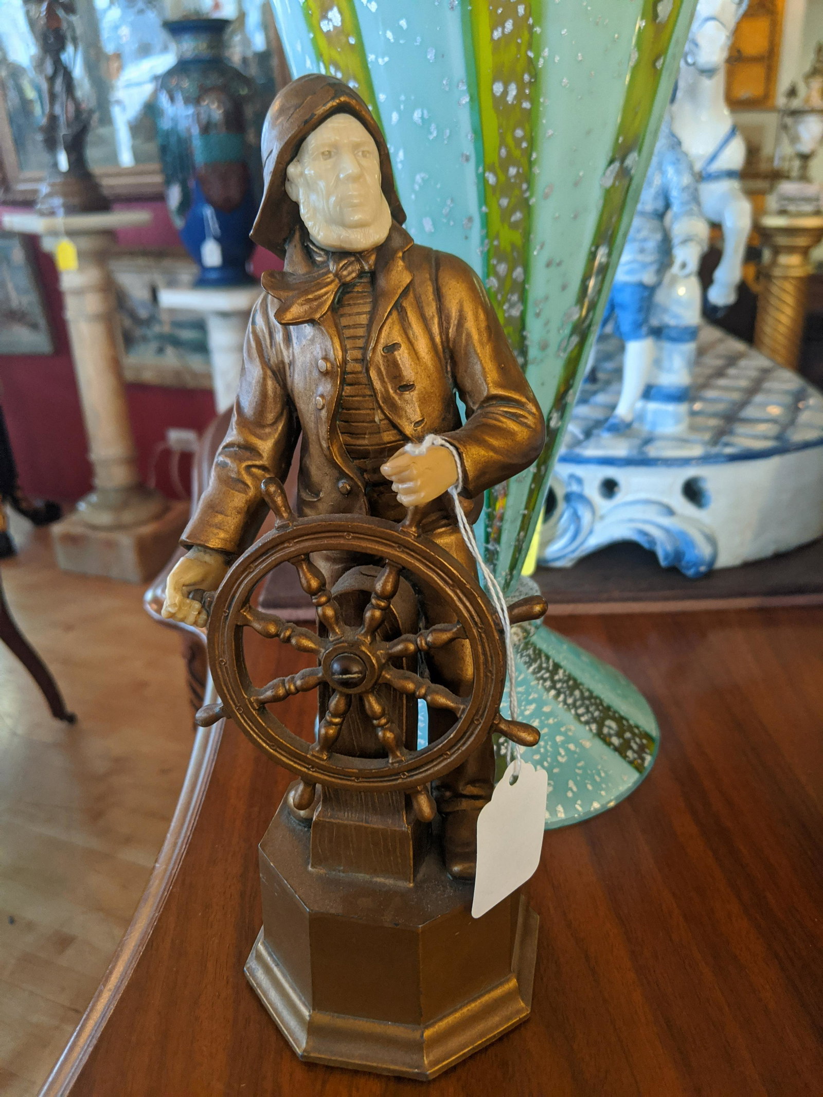 1920's Metal & Resin Sailor at Ships Wheel Sculpture: 1920's Metal & Resin Sailor at Ships Wheel Sculpture Figure 10 high Shipping in continental US $18.00 If shipping is $0 then buyer arranges pick up or shipping. Please ask any questions before bidding