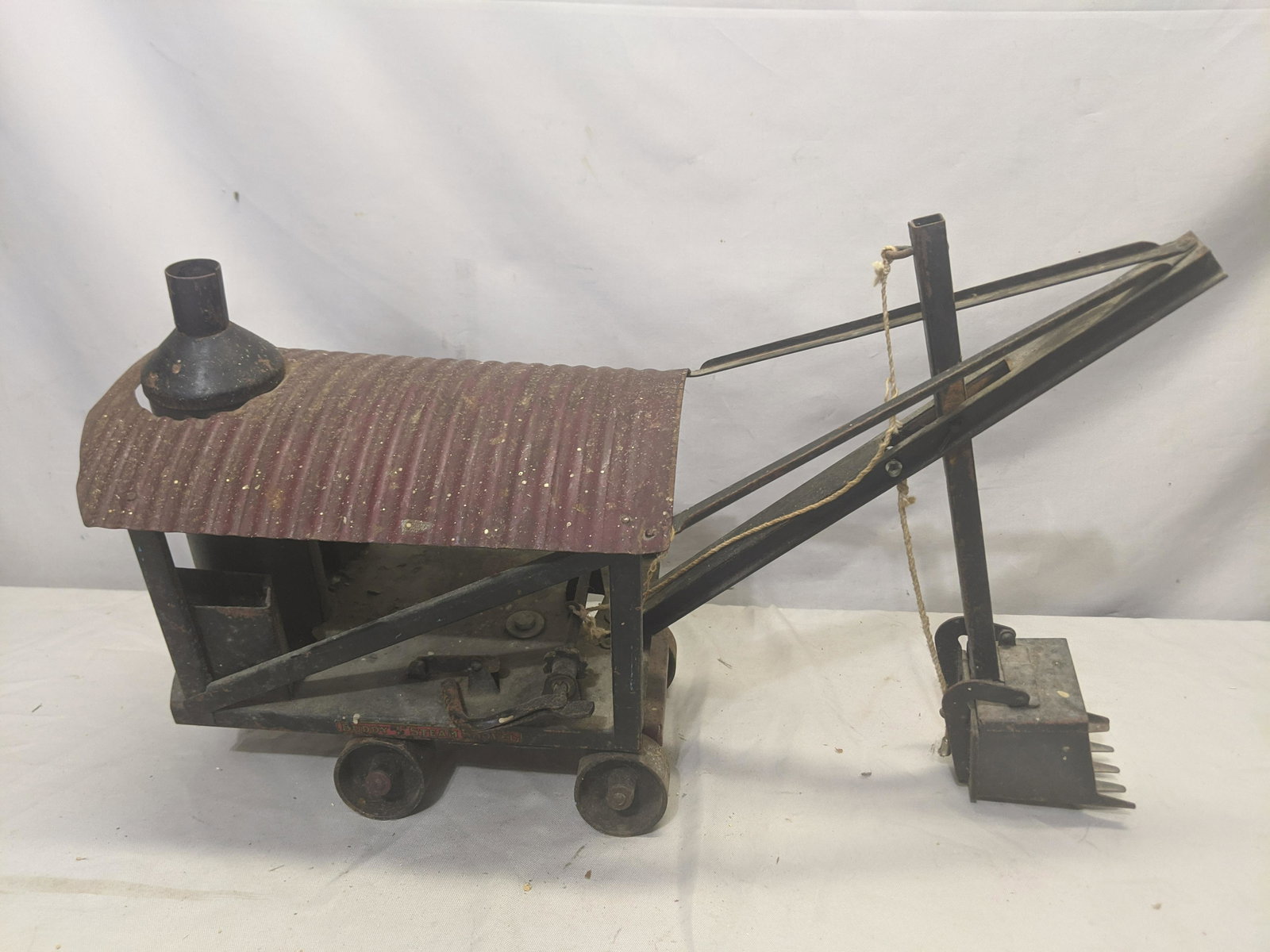 1920's Pressed Steel Buddy L Steam Shovel: 1920's Pressed Steel Buddy L Steam Shovel 20 long Shipping in continental US $25.00 If shipping is $0 then buyer arranges pick up or shipping. Please ask any questions before bidding Good Luck!