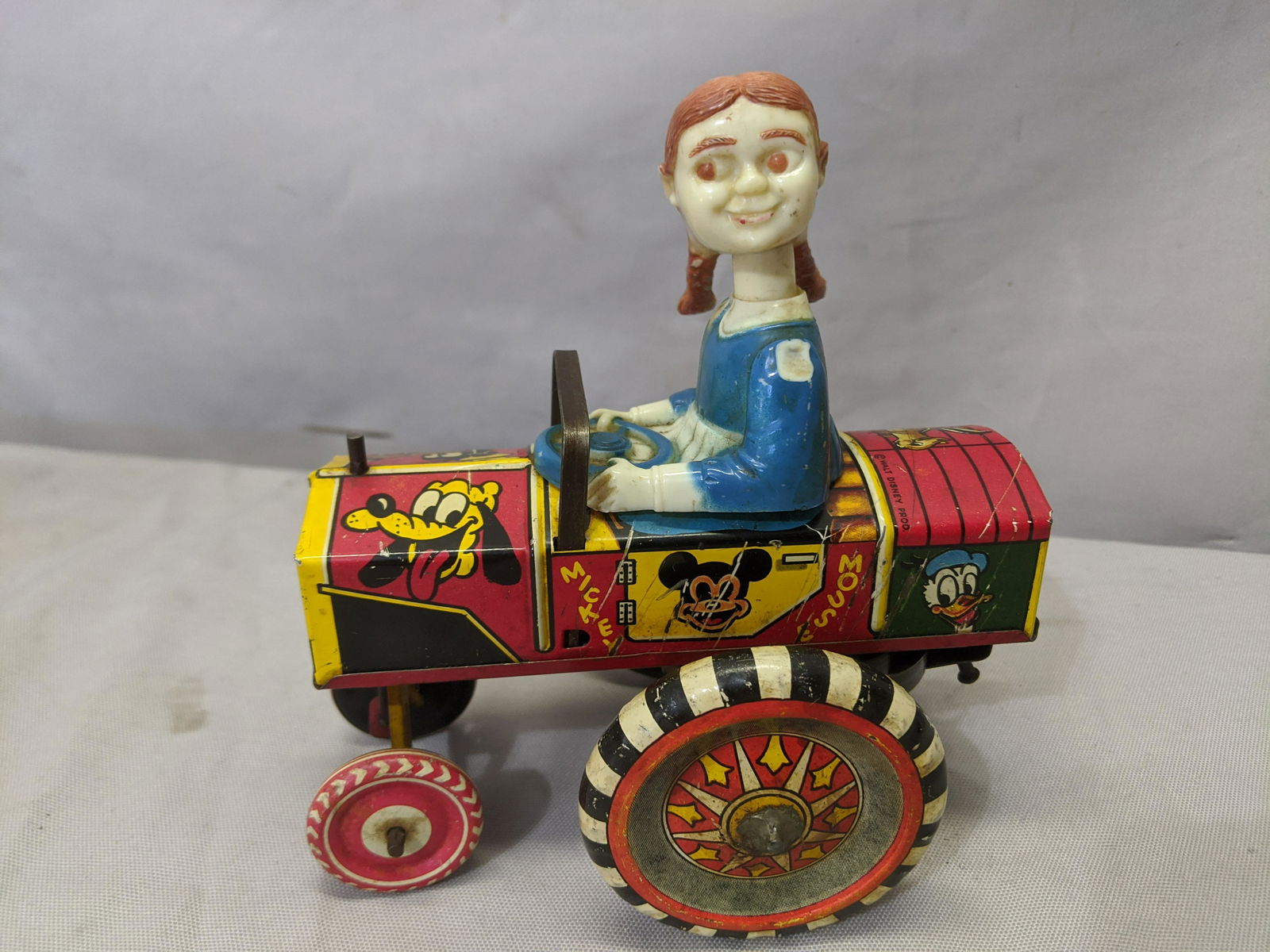 Walt Disney Prod Marx Tin Litho Wind Up Girl in Car (1 of 6)