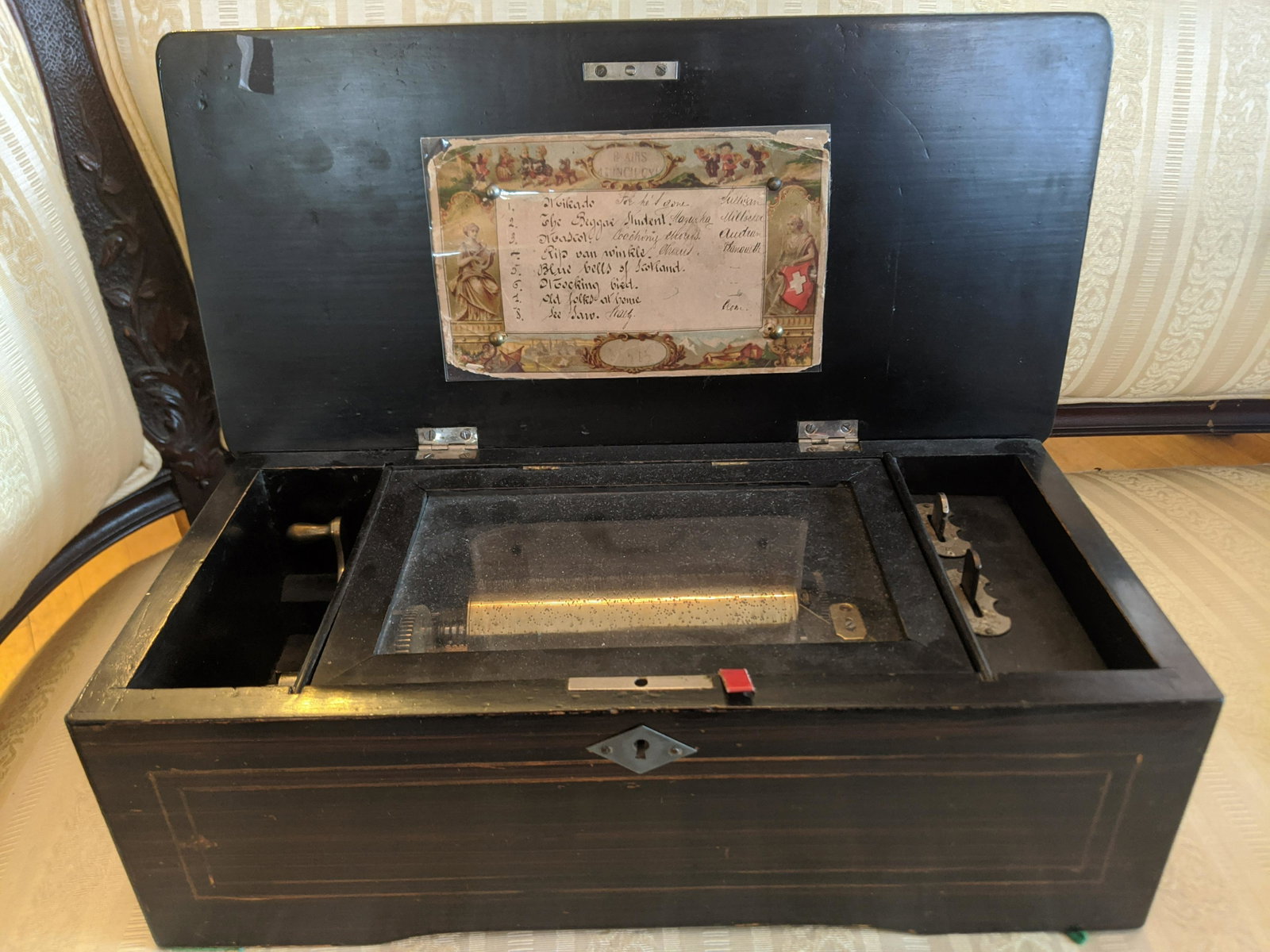 Antique Swiss 8 Song Wind Up Music Box: Antique Swiss 8 Song Wind Up Music Box w/ 4 7/8 cylinder 5 x 14 x 7 Shipping in continental US $25.00 If shipping is $0 then buyer arranges pick up or shipping. Please ask any questions before bidding