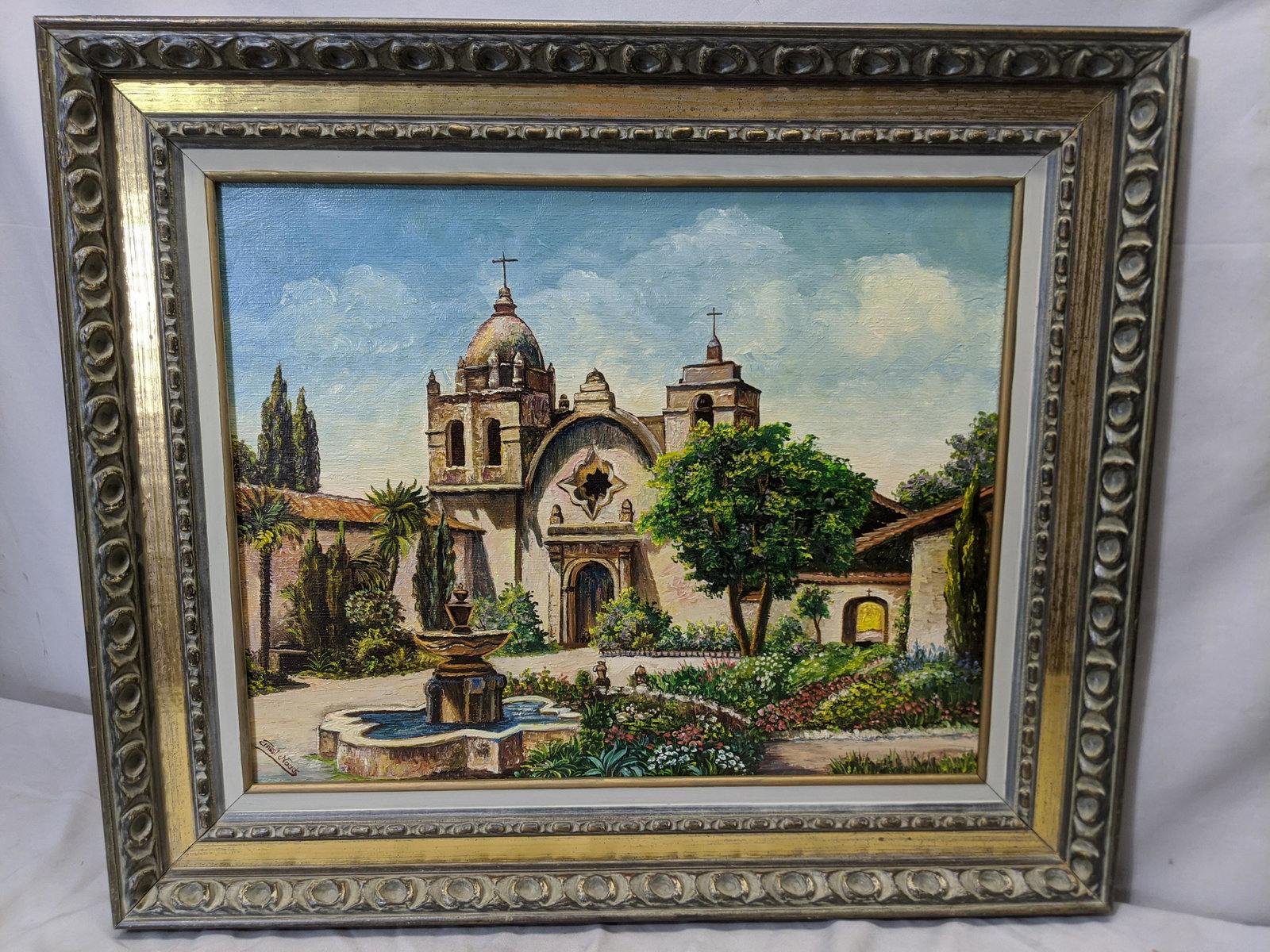 Signed Ernest Mission San Carlos Borromeo Oil Painting: Signed Ernest Mission San Carlos Borromeo Oil Painting on canvas in frame. Signed lower left and titled on the reverse 27 x 23, Image: 19 x 15 1/2 Shipping in continental US $44.00 If shipping is $0 t