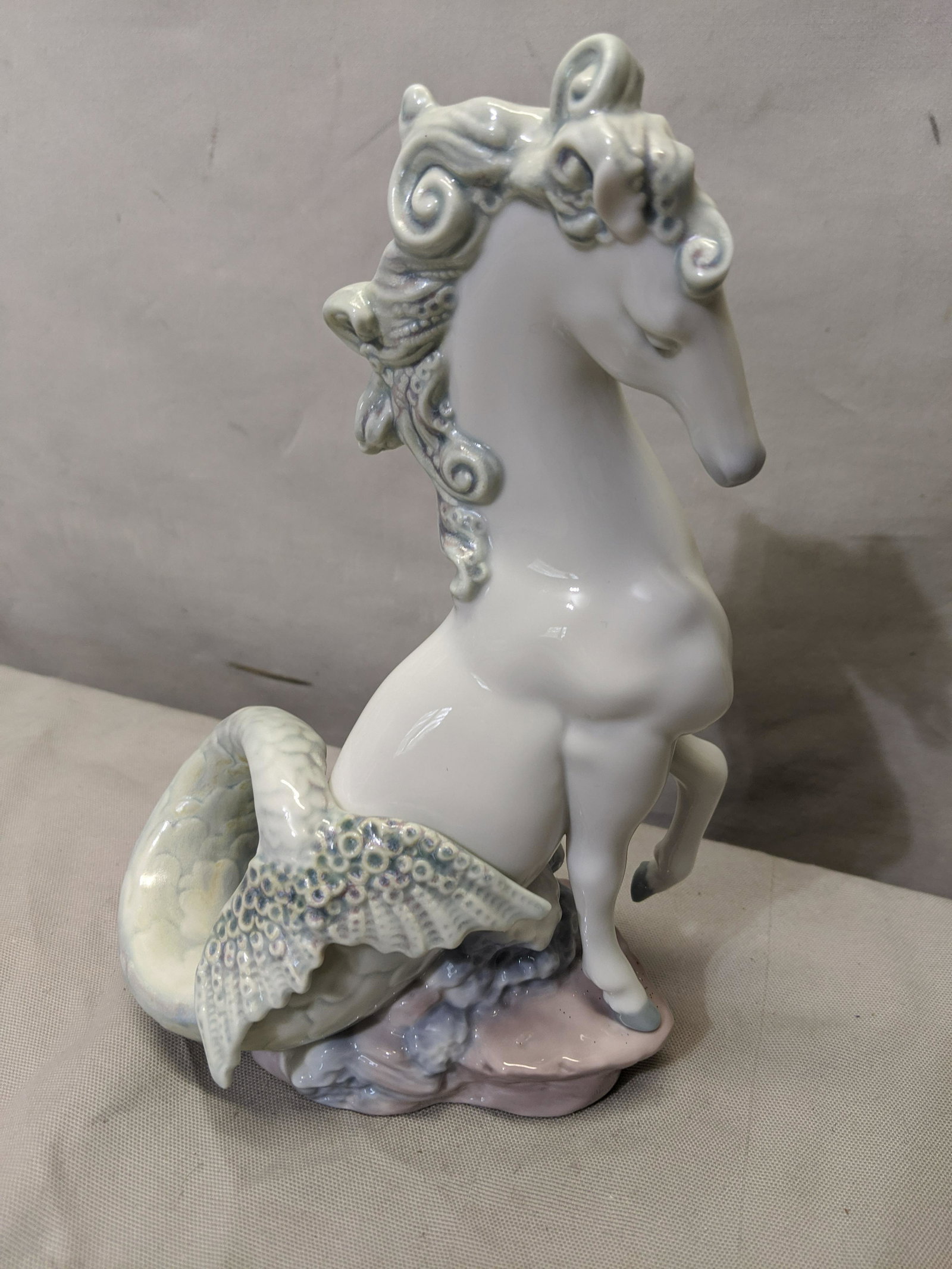 2003 Lladro Triton II Porcelain Figurine: 2003 Lladro Triton II Porcelain Figurine 8 1/2 high Shipping in continental US $20.00 If shipping is $0 then buyer arranges pick up or shipping. Please ask any questions before bidding Good Luck!
