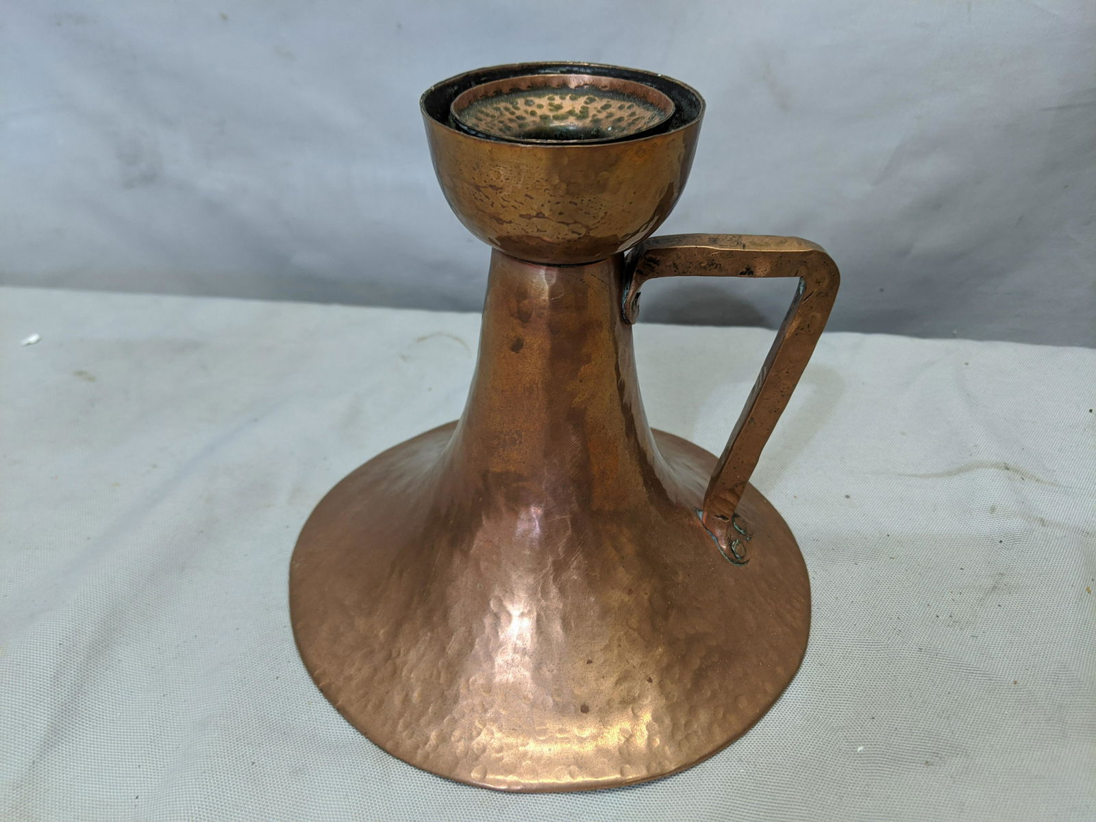 Art & Crafts Hand Hammered Copper Handled Candle Holder: Art & Crafts Hand Hammered Copper Handled Candle Holder 6 high x 6 1/4 diameter Shipping in continental US $15.00 If shipping is $0 then buyer arranges pick up or shipping. Please ask any questions be