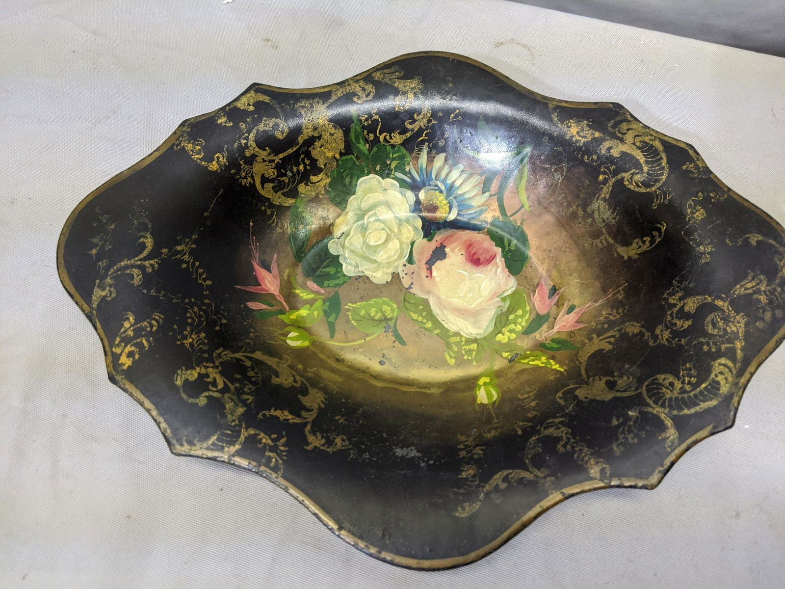 Antique Toleware Painted Metal Floral Oval Tray: Antique Toleware Painted Metal Floral Oval Tray with open handles 14 x 9 1/2 Shipping in continental US $15.00 If shipping is $0 then buyer arranges pick up or shipping. Please ask any questions befor