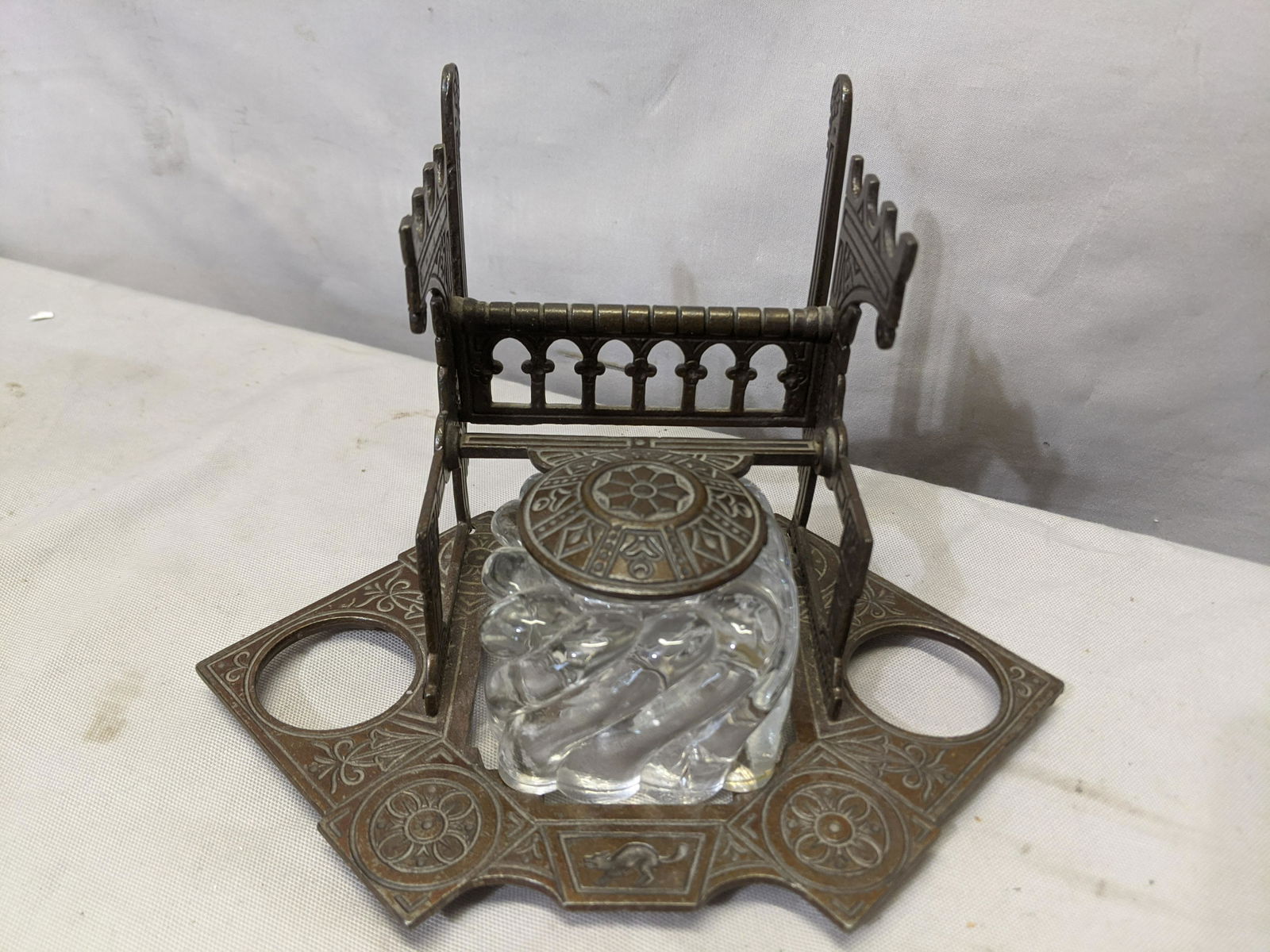 1879 Eastlake Metal Desk Set Inkwell: 1879 Eastlake Metal Desk Set Inkwell with glass inkwell 5 high x 8 x 5 Shipping in continental US $15.00 If shipping is $0 then buyer arranges pick up or shipping. Please ask any questions before bidd