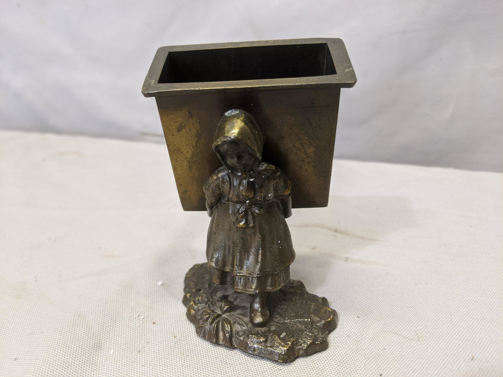 Old Girl Smoking Cigar Figural Brass Match Holder: Old Girl Smoking Cigar Figural Brass Match Holder 4 high Shipping in continental US $8.00 If shipping is $0 then buyer arranges pick up or shipping. Please ask any questions before bidding Good Luck!