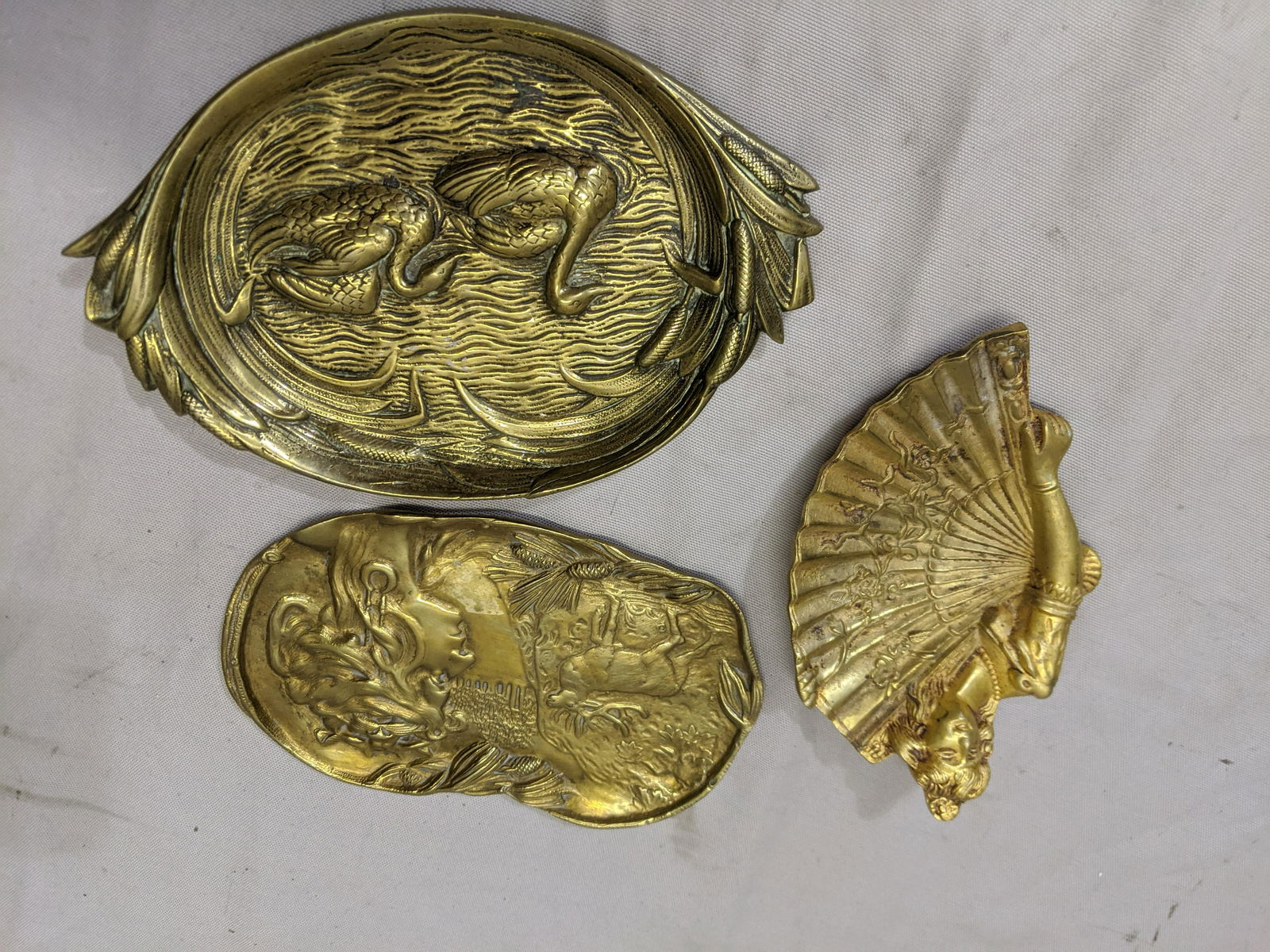 Lot 3 Old Art Nouveau Brass Dresser Jewelry Trays: Lot 3 Old Art Nouveau Brass Dresser Jewelry Trays including girl with fan, swans on lake and Girl with elk 6 x 4, 7 x 4 1/2 and 8 x 5 Shipping in continental US $12.00 If shipping is $0 then buyer arr