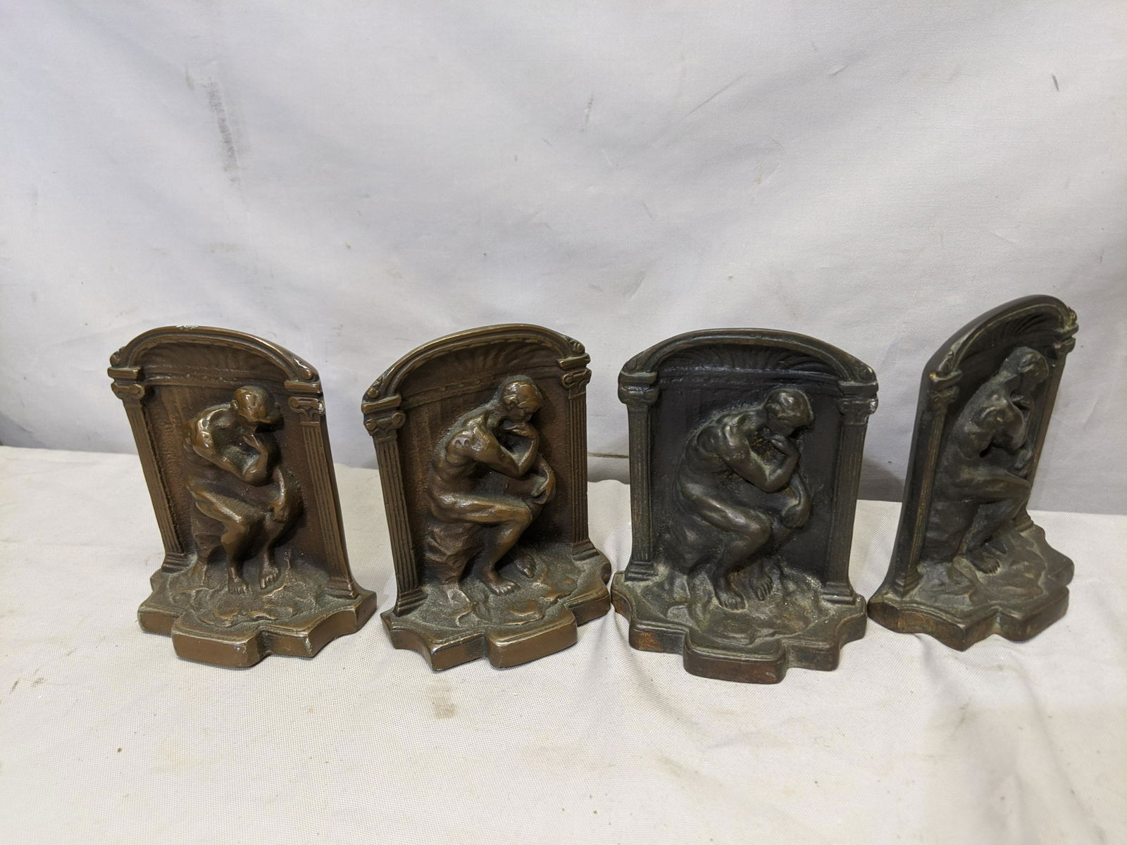 2 Pair Vintage The Thinker Bronze Bookends: 2 Pair Vintage The Thinker Bronze Bookends 5 1/2 high Shipping in continental US $22.00 If shipping is $0 then buyer arranges pick up or shipping. Please ask any questions before bidding Good Luck!