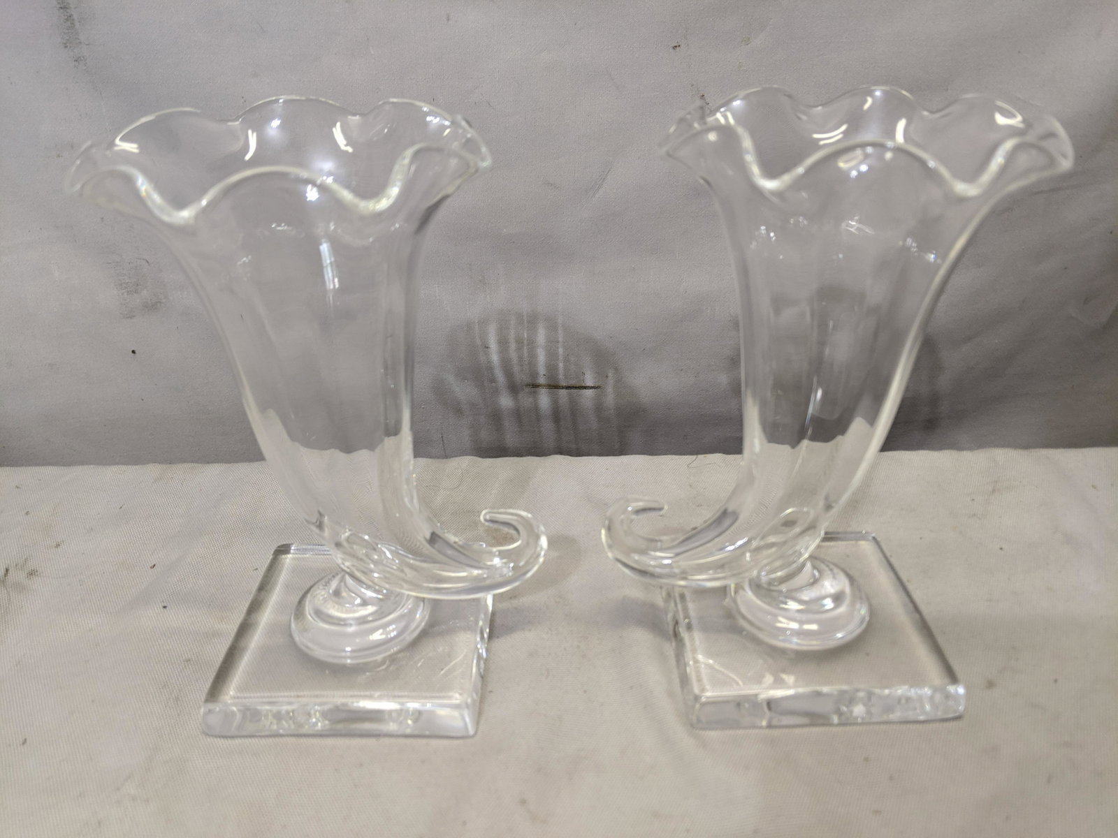 Pair Steuben Crystal Cornucopia Vases: Pair Steuben Crystal Cornucopia Vases. Measurements in inches:6 1/2 high We offer in-house shipping. Item(s) will be packed after invoice is paid and shipping cost will be collected seperatly via the 