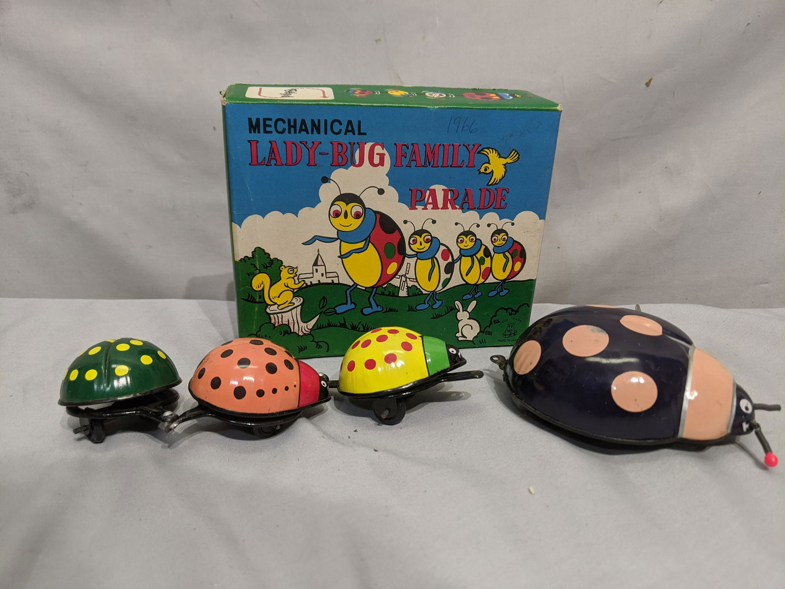 Japan Tin Litho Wind Up Mechanical Lady-Bug Family (1 of 5)