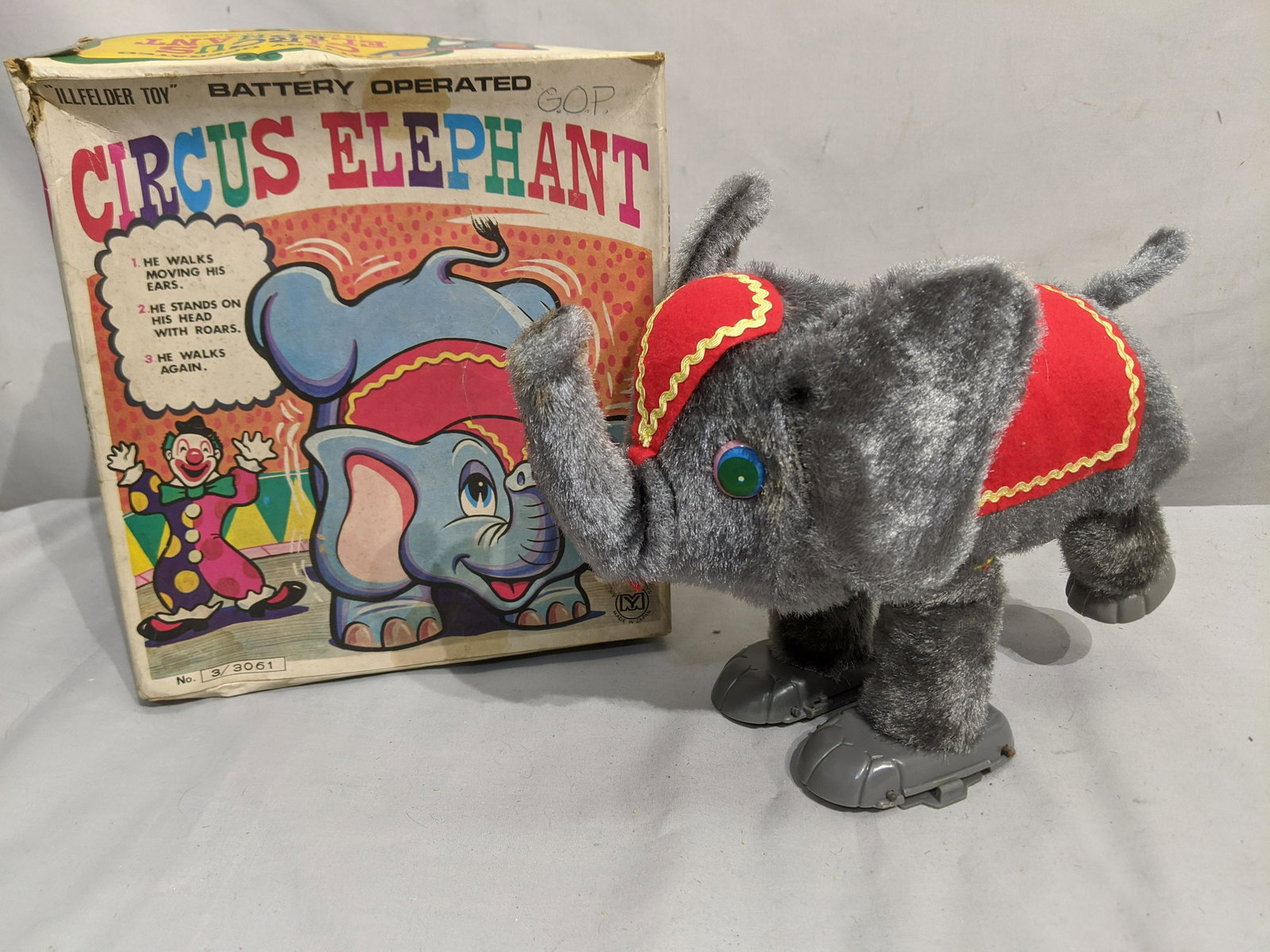 Vintage Illfelder Toy Battery-Op Circus Elephant in Box: Vintage Illfelder Toy Battery-Op Circus Elephant in Box. Measurements in inches: 10 long We offer in-house shipping. Item(s) will be packed after invoice is paid and shipping cost will be collected se