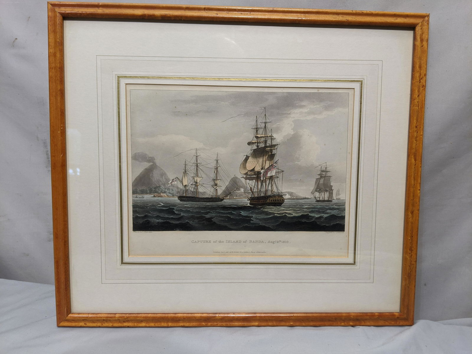 1810 Capture of The Island of Banda Engraving by: 1810 Capture of The Island of Banda Engraving Painted by Thomas Whitcombe and engraved by Thomas Sutherland and published 1816. Framed under glass. Measurements in inches: 17 3/4 x 15, Image: 10 1/2 x