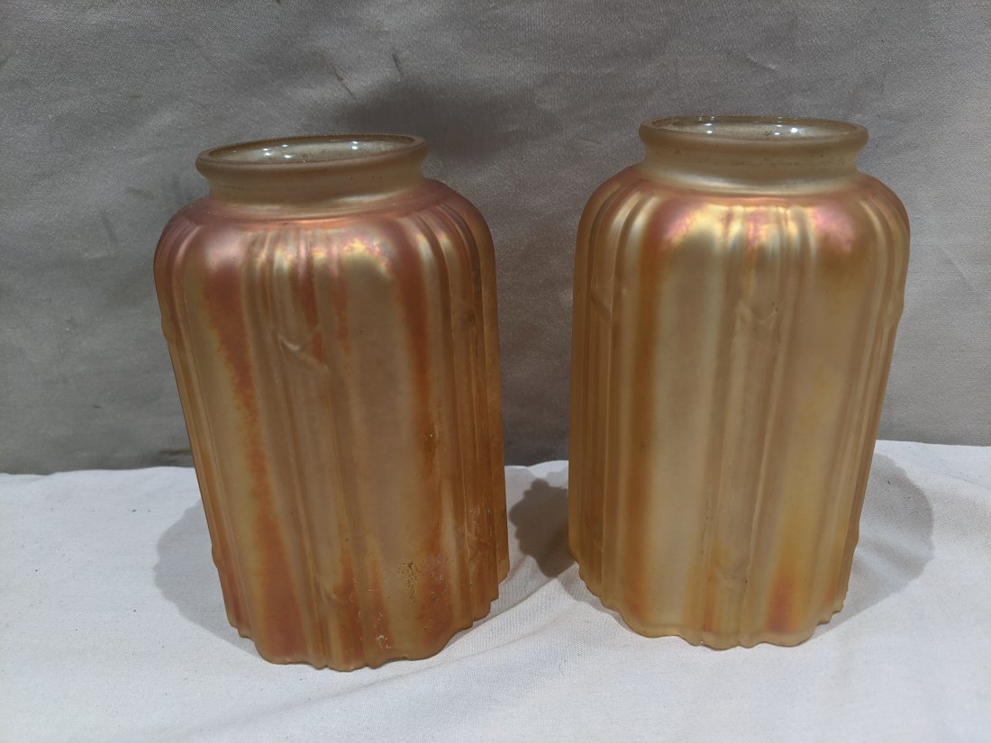 Pair Antique Carnival Marigold Art Glass Lamp Shades: Pair Antique Carnival Marigold Art Glass Lamp Shades. Measurements in inches: 5 high x 3 diameter, 2 inch lip Condition:One has a shallow chip on open end Shipping:We offer in-house shipping. Item(s) 